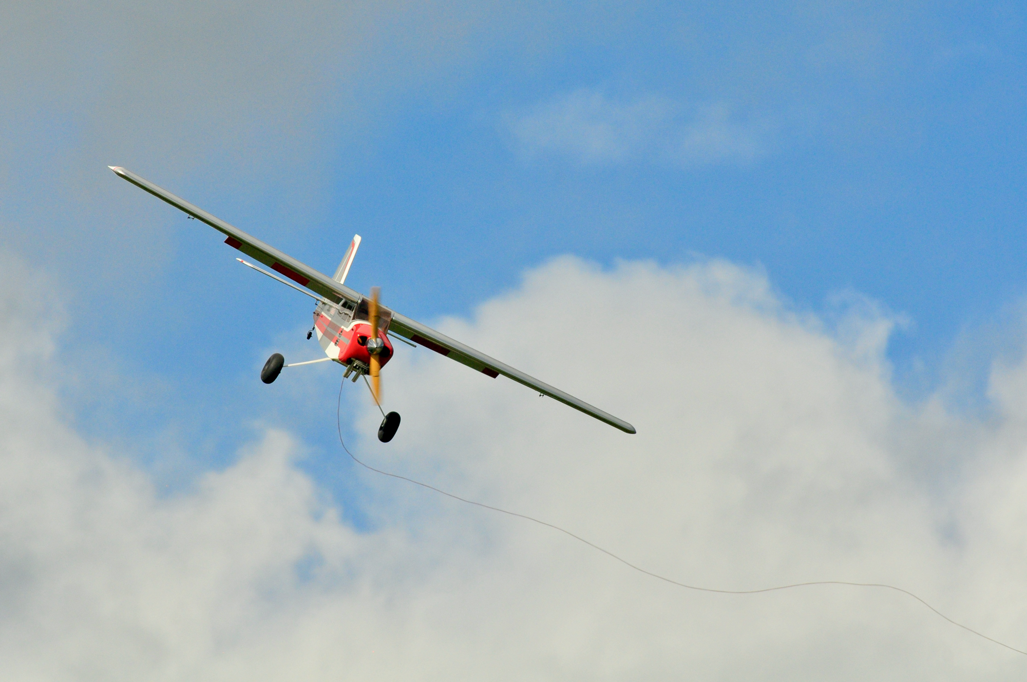 Valiant 30cc tow-plane in action